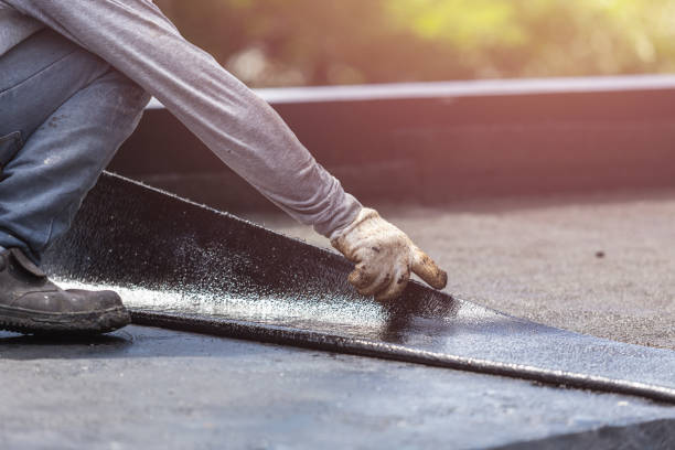 Professional Basement Waterproofing technician working in Arcola, IN